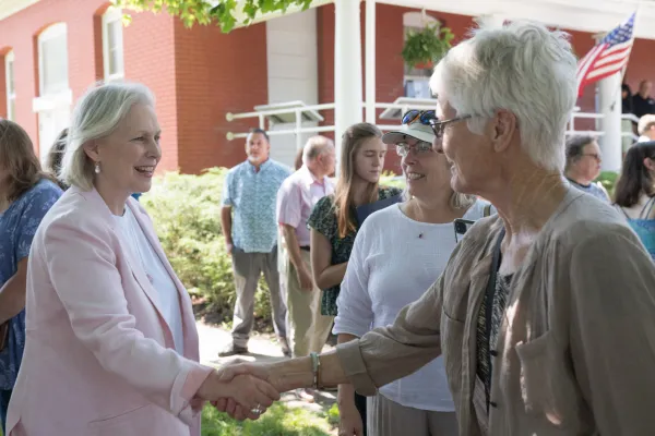 Senator Gillibrand shaking hands with a constituent